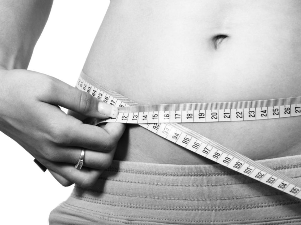 measuring-belly-female-black-and-white-image