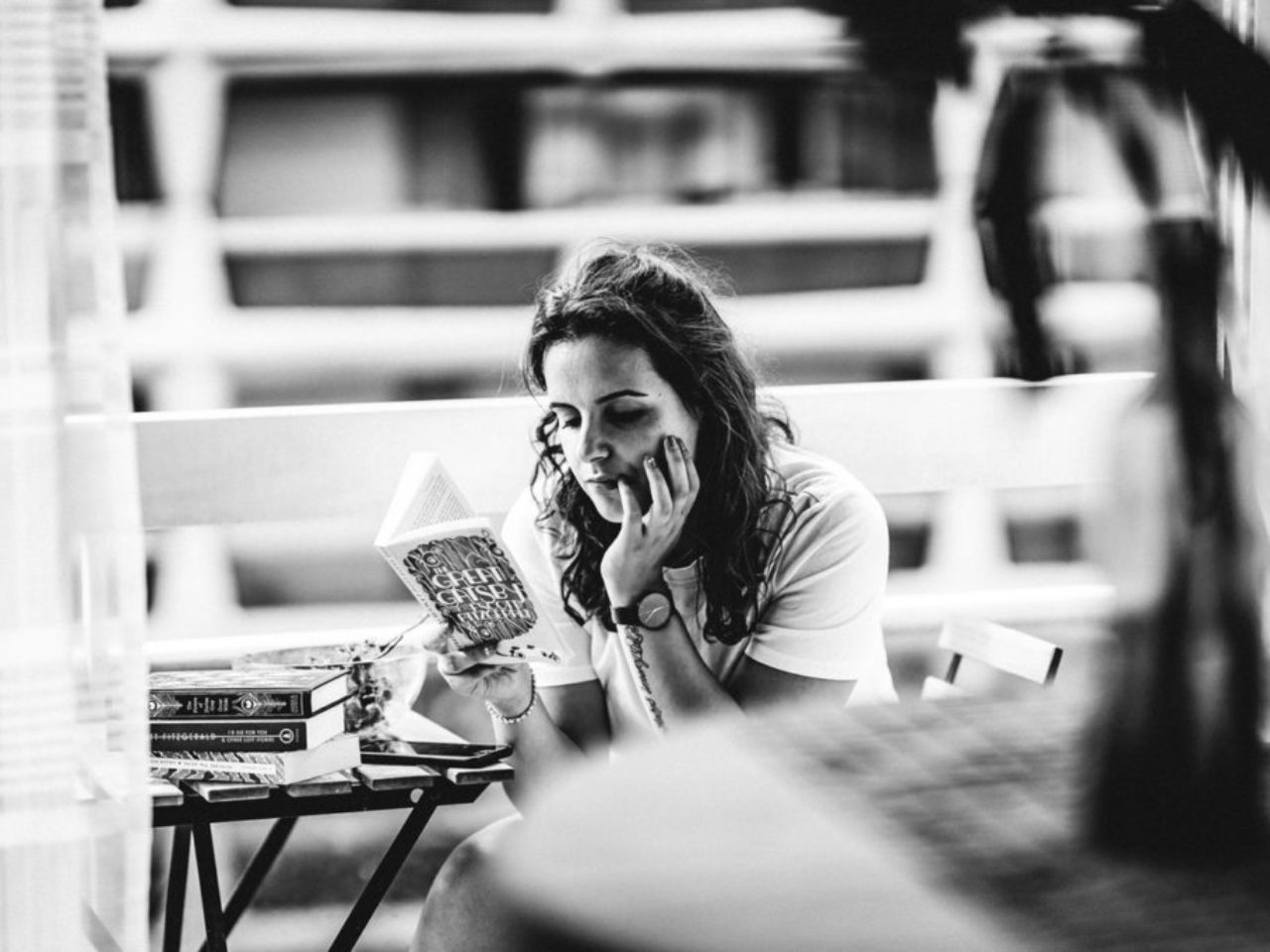 grayscale-photography-of-woman-reading-book